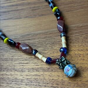 Handcrafted Beaded Necklace with Multicolor Accents and monkey bead
